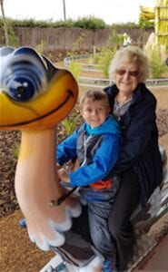 AUDREY RHODES, FOUNDER OF SUNDOWN ADVENTURELAND WITH GREAT GRANDSON CONNOR GRIFFIN